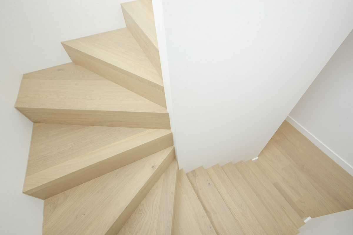 Mitred stair nosing detail on engineered oak staircase