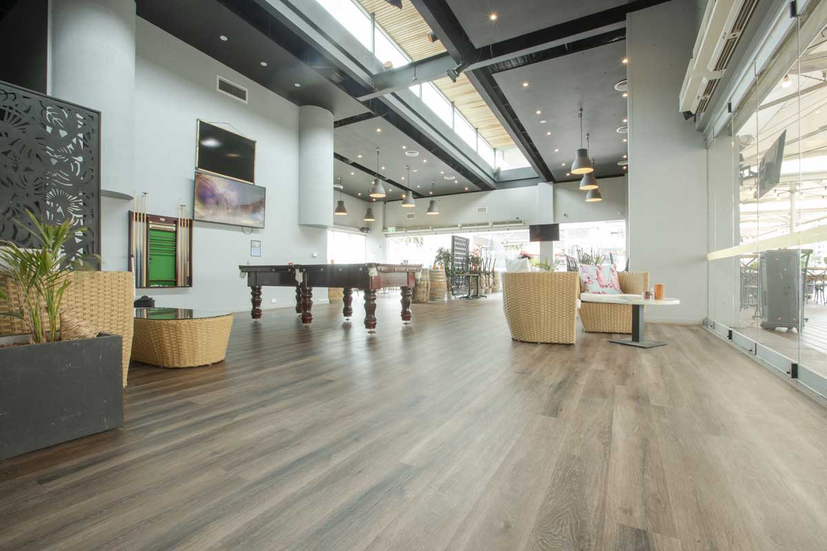 Coco Wash SPC hybrid flooring across a large open dining and lounge area in a Port Melbourne restaurant