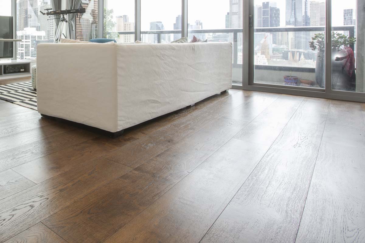 Dark European Mocha Brown oak flooring in a Southbank apartment with city views