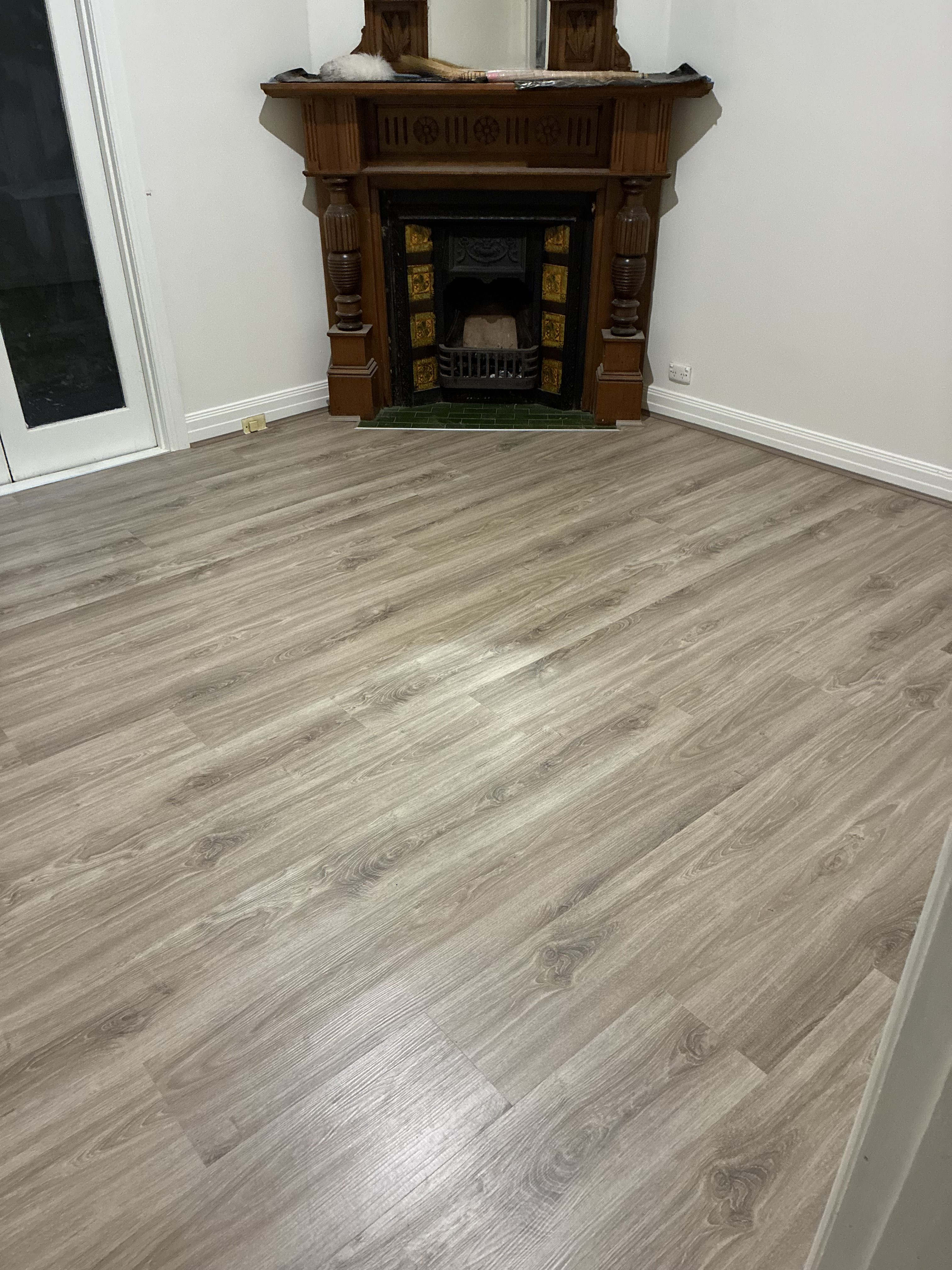 SPC Hybrid Brown Washed flooring in a renovated Caulfield North living room