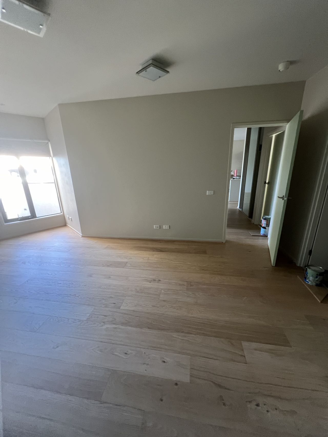 Engineered oak flooring installed over acoustic underlay in a St Kilda apartment