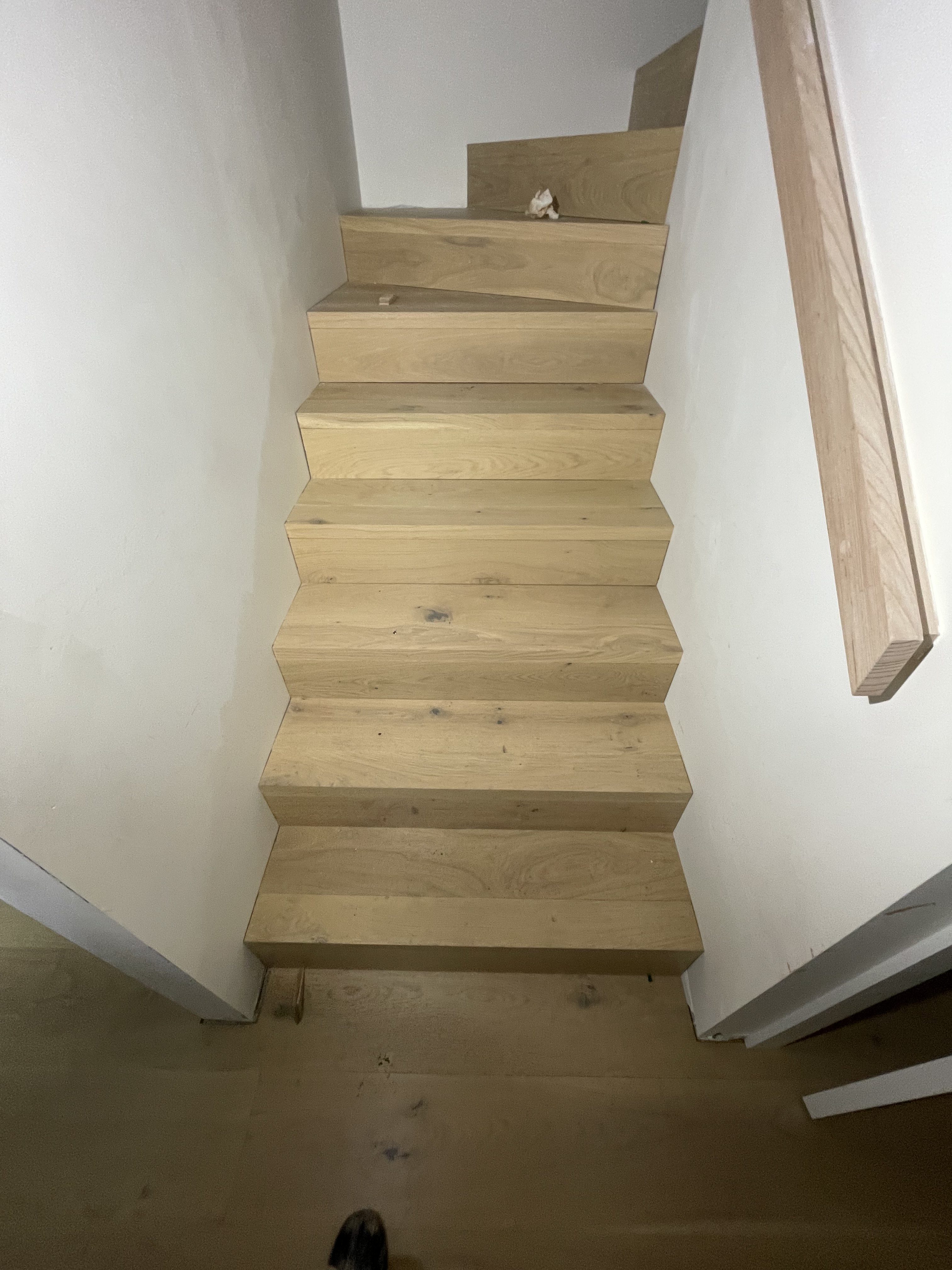 Staircase mid renovation with mitred stair nosing being fitted