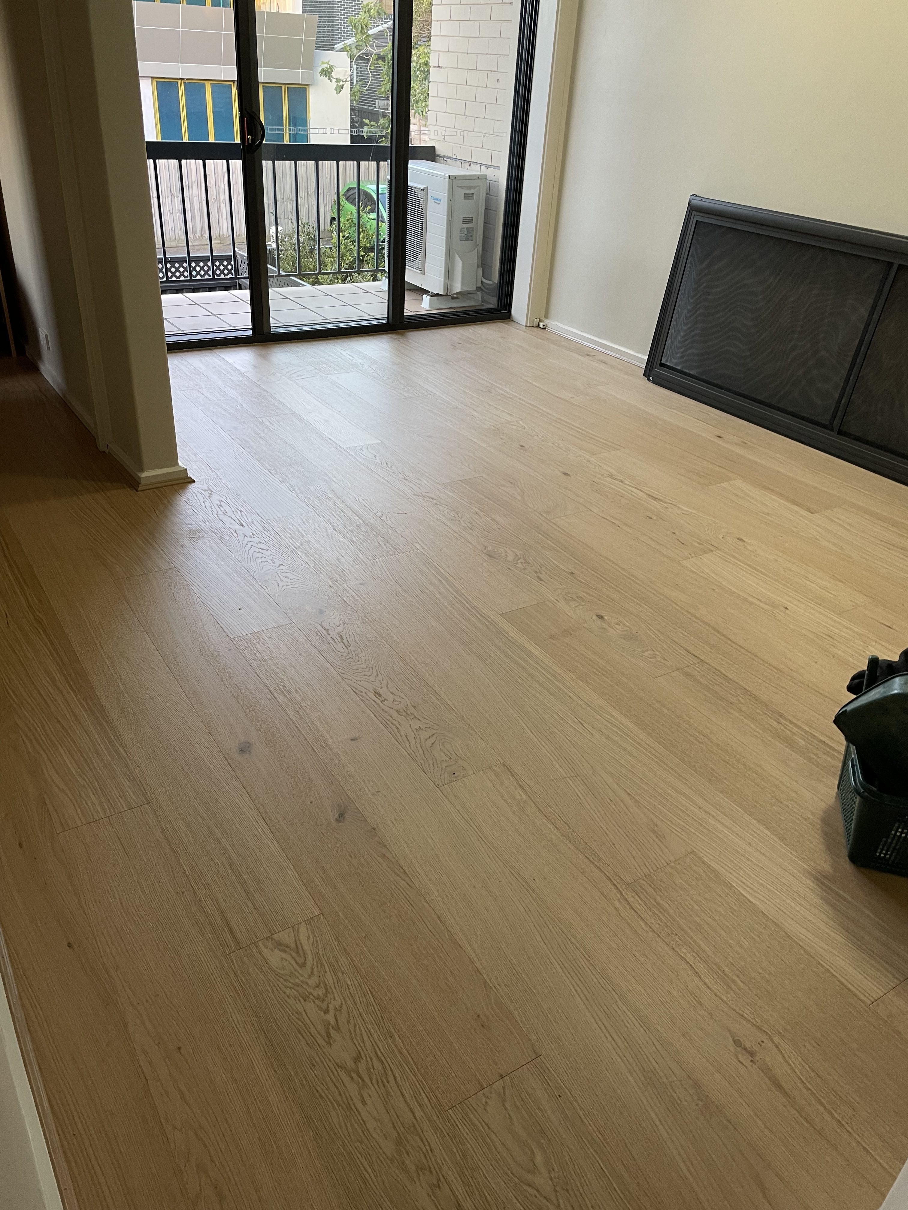 Sandy Oak engineered floorboards with visible grain in a Melbourne apartment