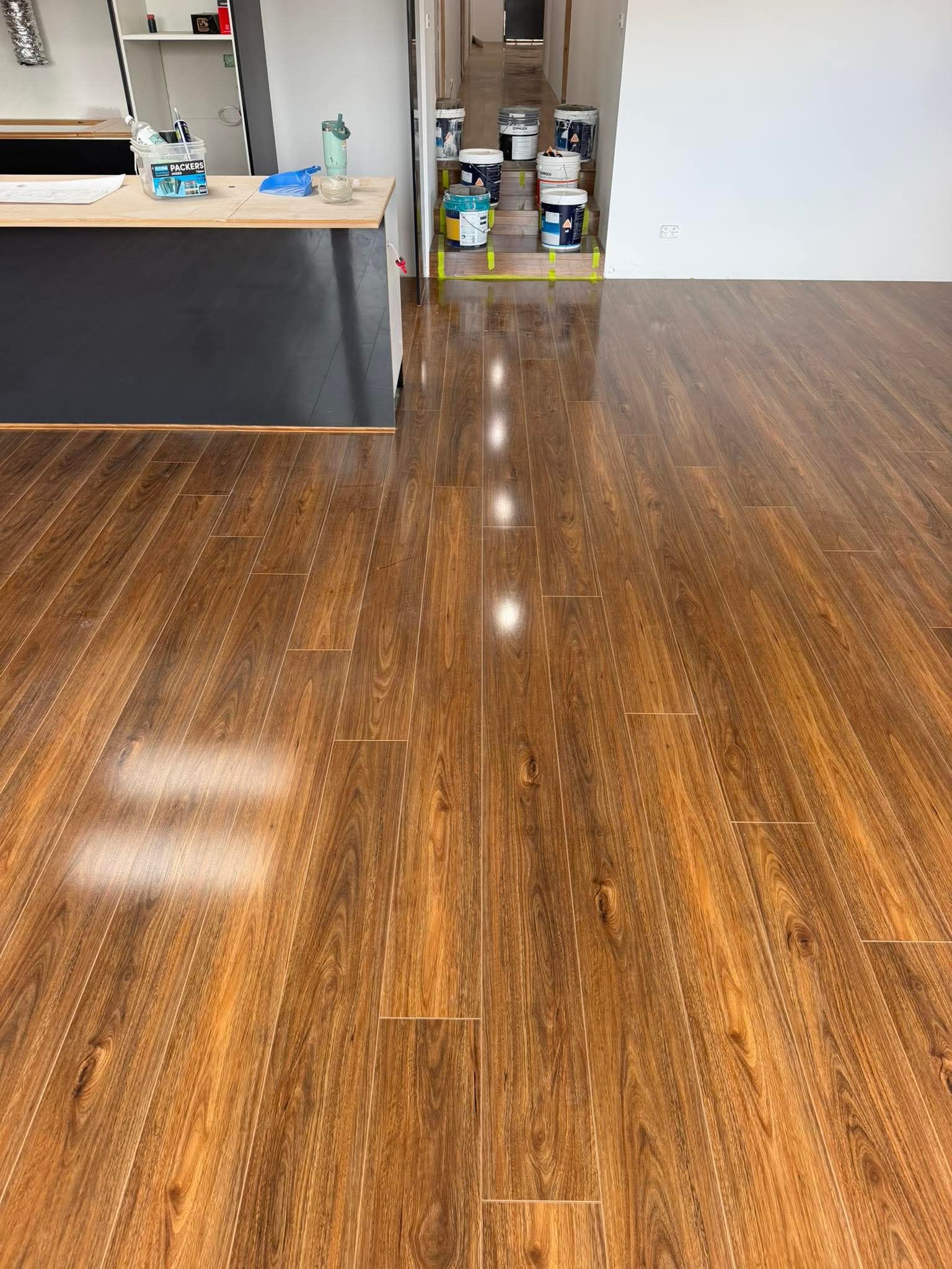 Laminate Spotted Gum flooring in an open plan Clayton North home
